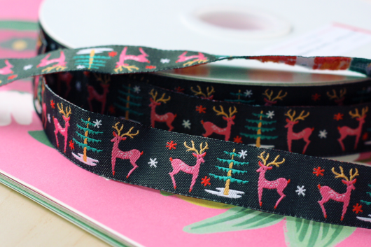 Cute deer holiday ribbon design