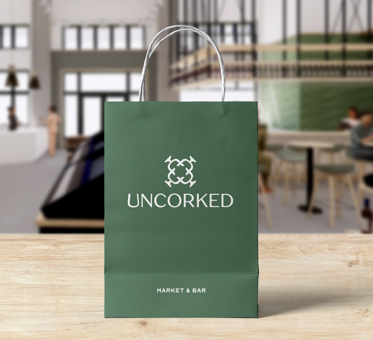 wine bar branding on green shopping bag