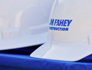 construction company branding on white hardhat