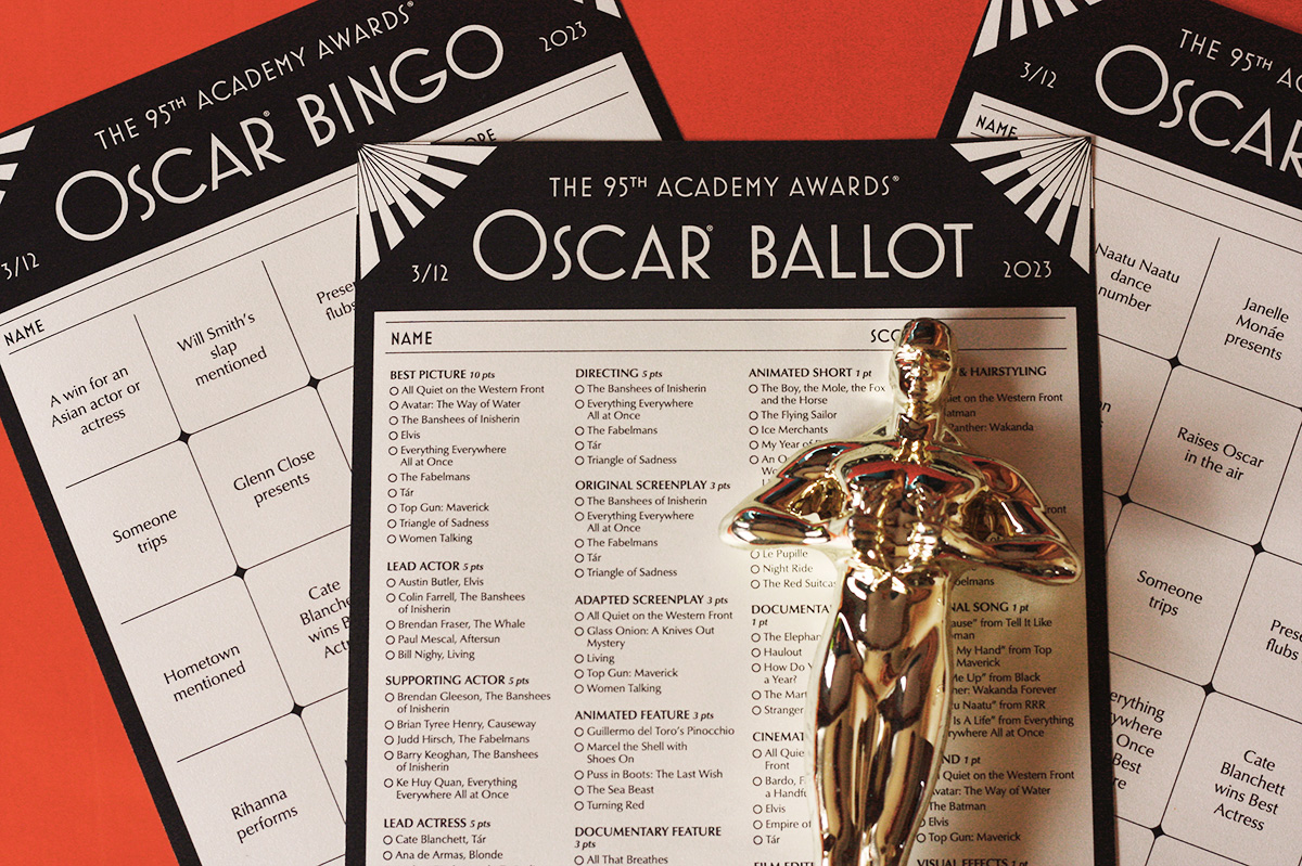 closeup of 2023 oscar ballot and bingo cards