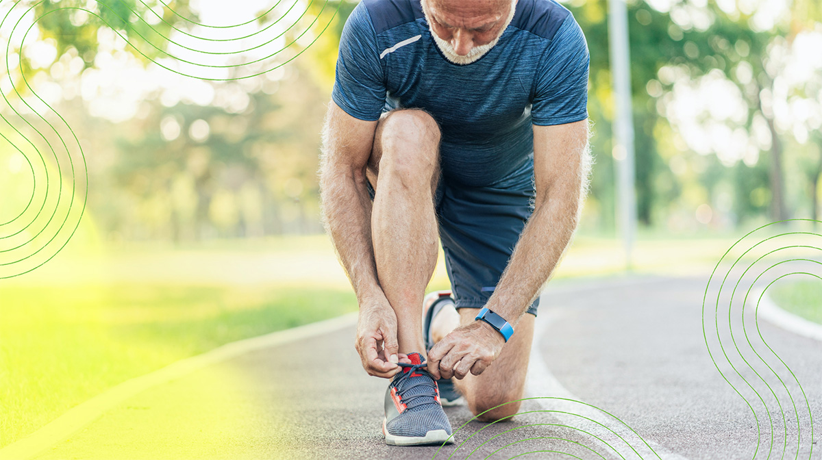 Photo of athletic man with white beard tying his running shoe, with wavy lines on top