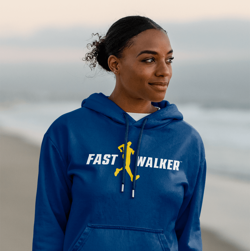 A woman wearing a navy hoodie for athletic brand FastWalker with a white logo
