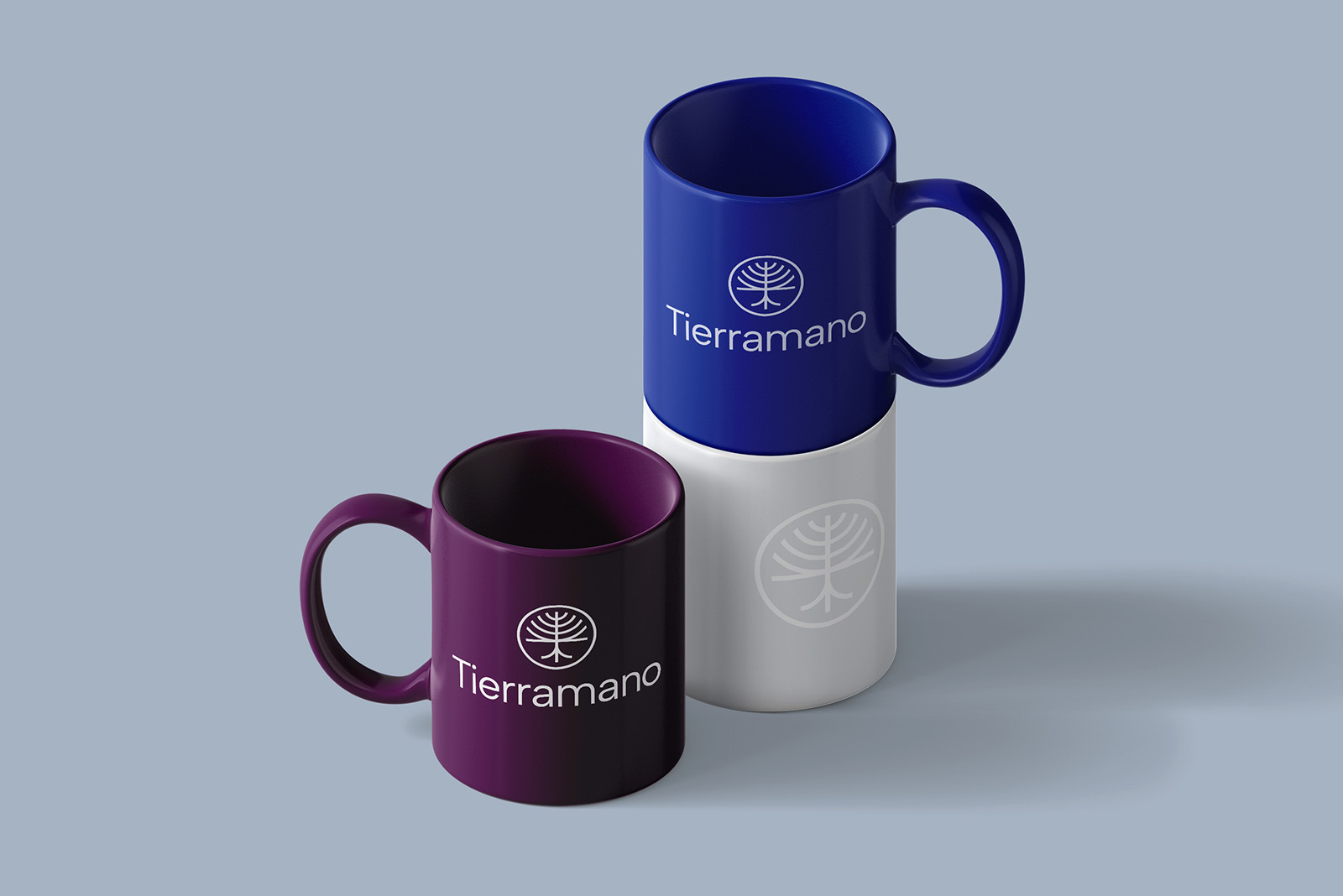 commercial real estate branded mugs in purple and blue